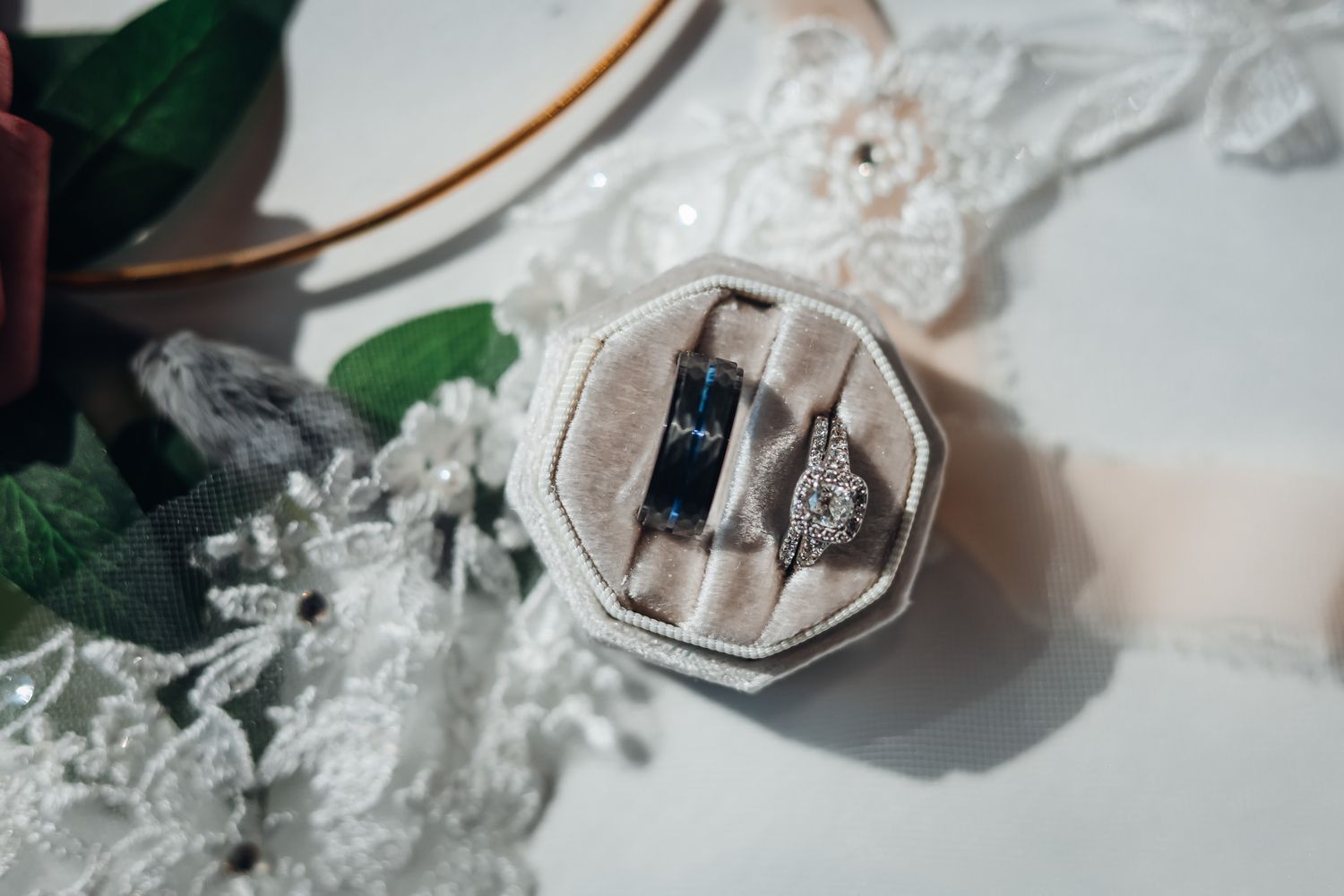 Close-up series of hands with engagement ring in soft, moody lighting.