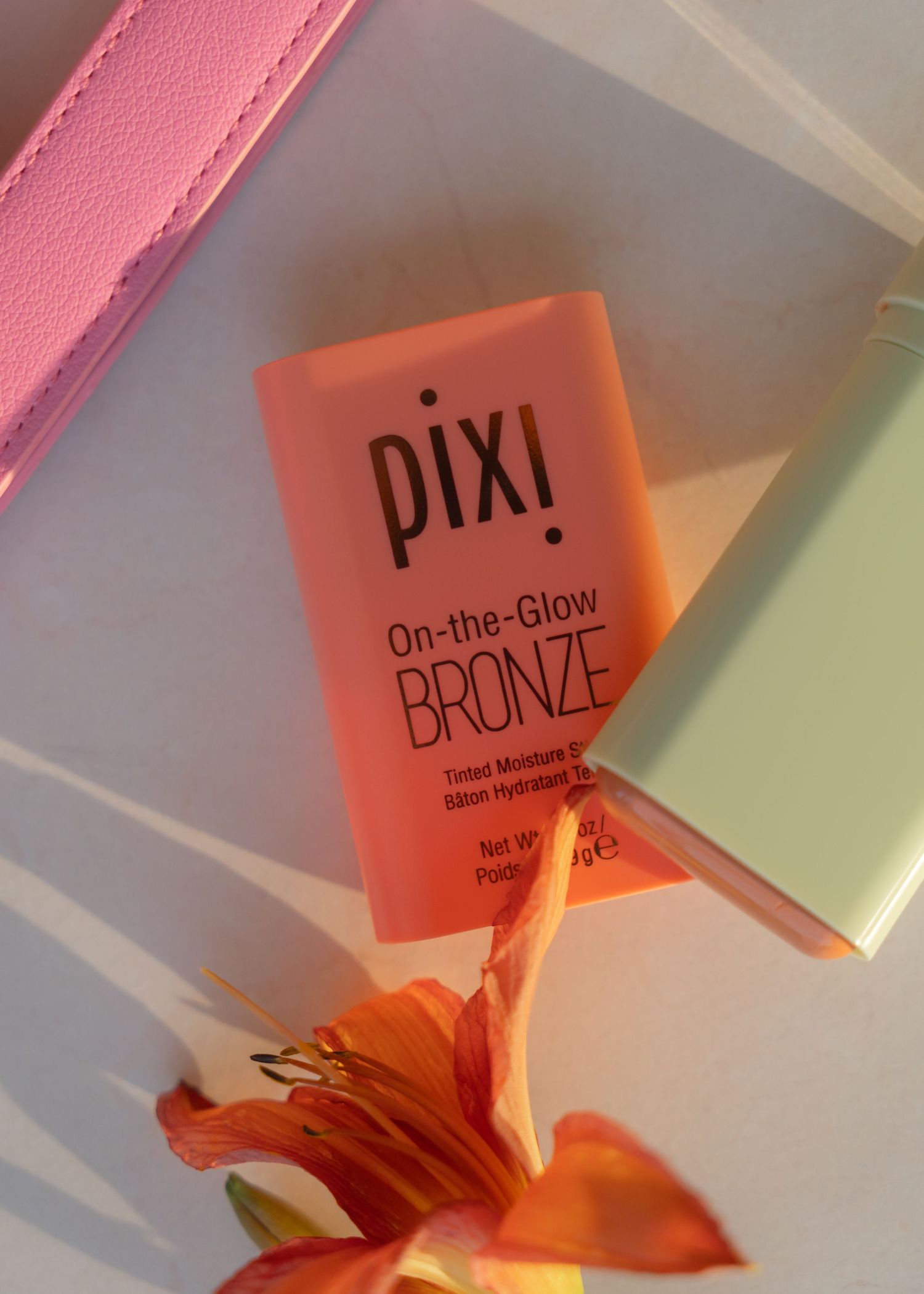 Flat Lay of Pixi On the Glow Bronze Blush Stick