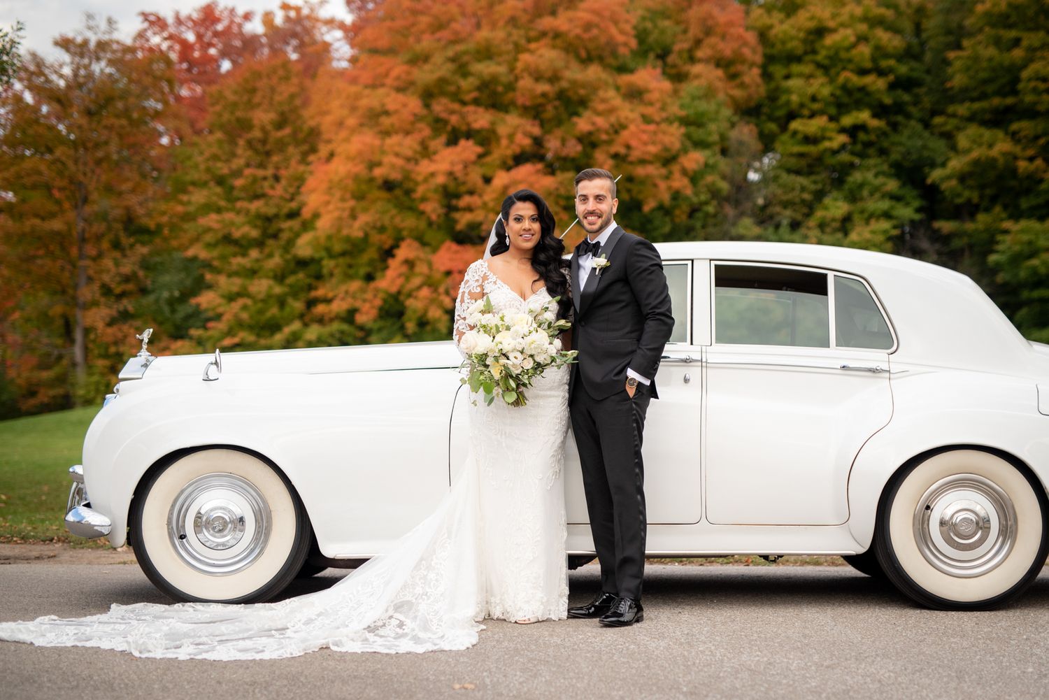 Romantic portrait of couple surrounded by autumn colors in Toronto.