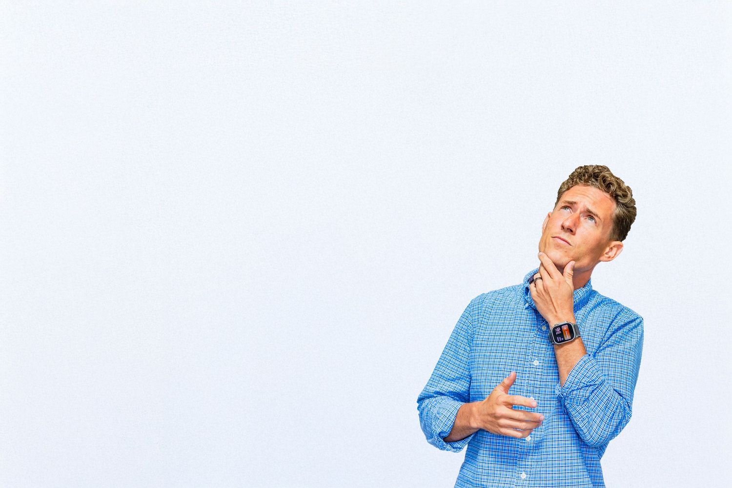 Joshua Moon in a blue button-down shirt demonstrating why SEO and photography are impactful for local lexington businesses.