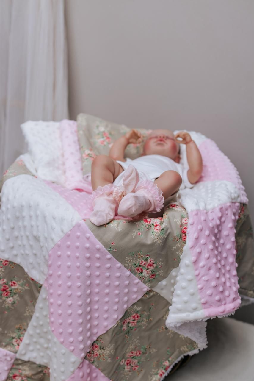 A pink and white minky fabric blanket with floral pattern is shown from multiple angles in a photo collage.
