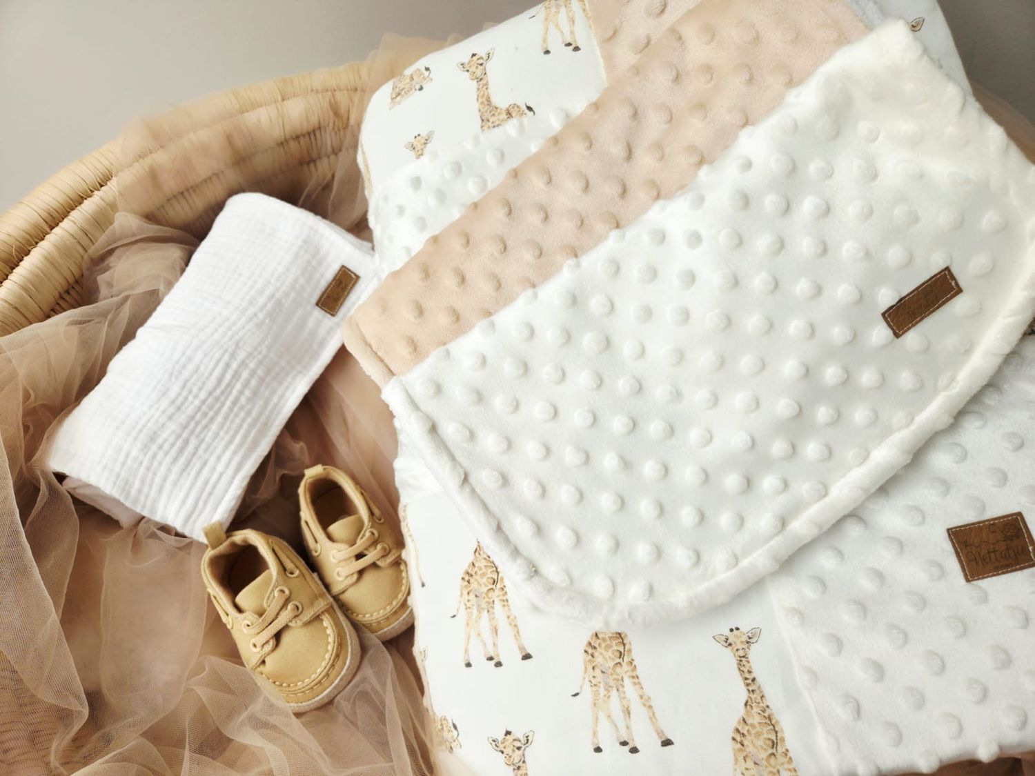 White minky dot fabric being sewn with gold thread on a sewing machine in a series of progress shots.