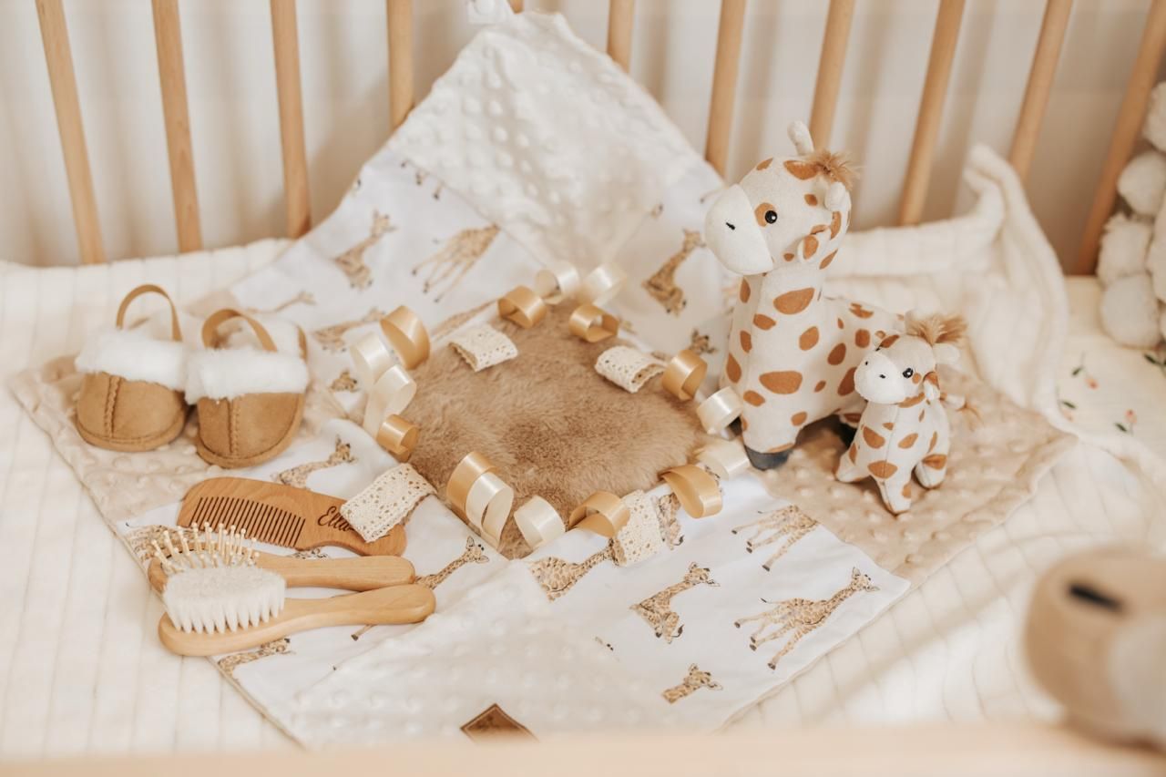 Scattered gingerbread cookies and lace doilies creating a rustic holiday composition on a neutral background.