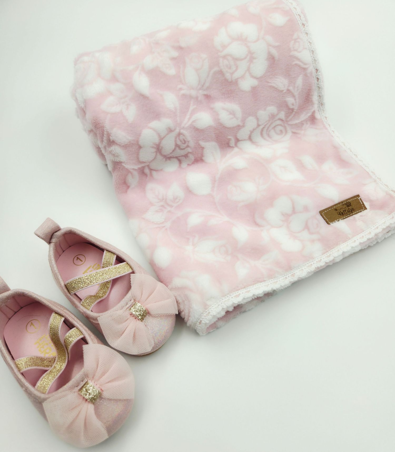 Pink polka dot baby blanket with matching ballet shoes for infants.