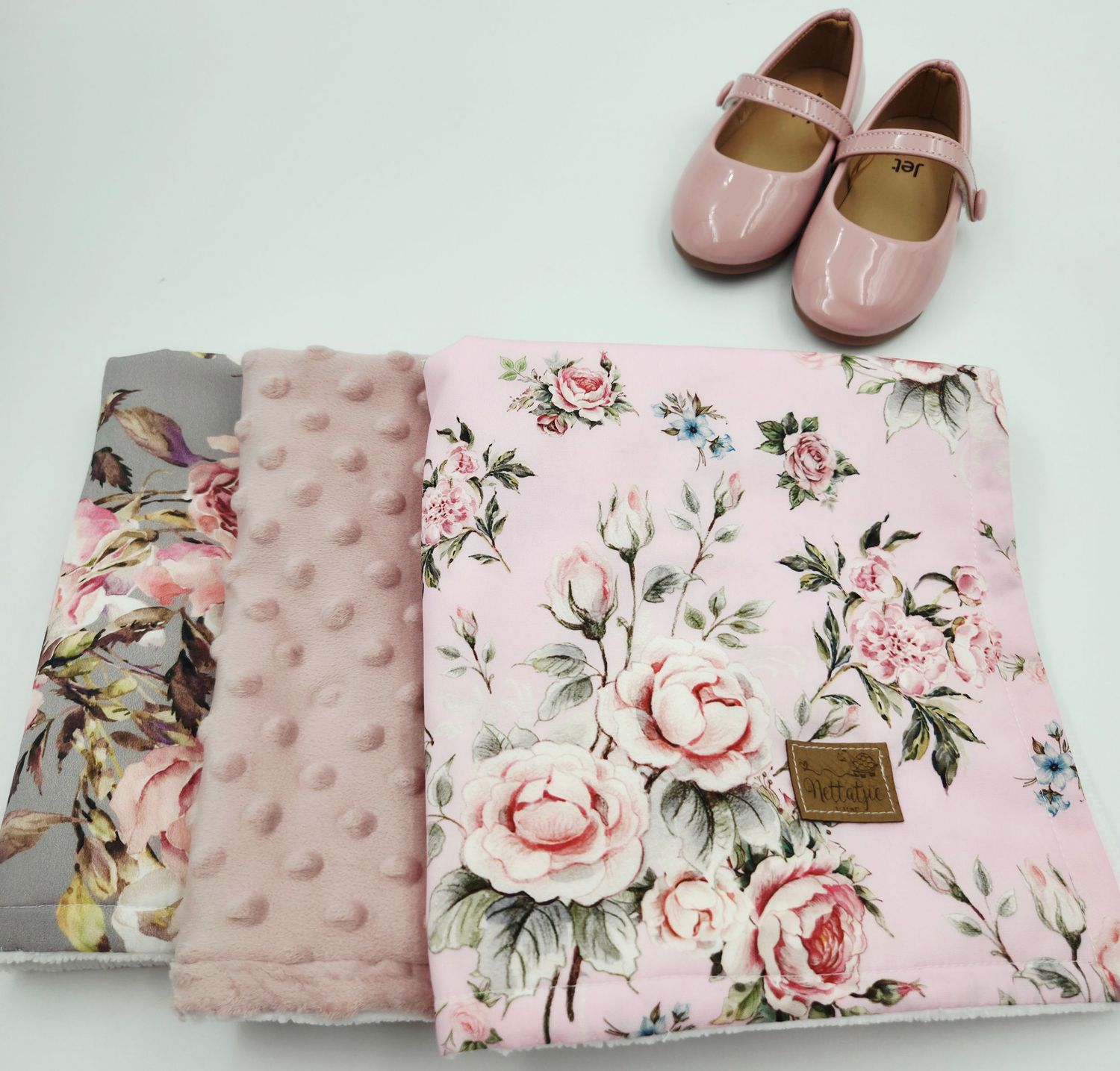 Pink floral baby blanket set with matching shoes and minky fabric.