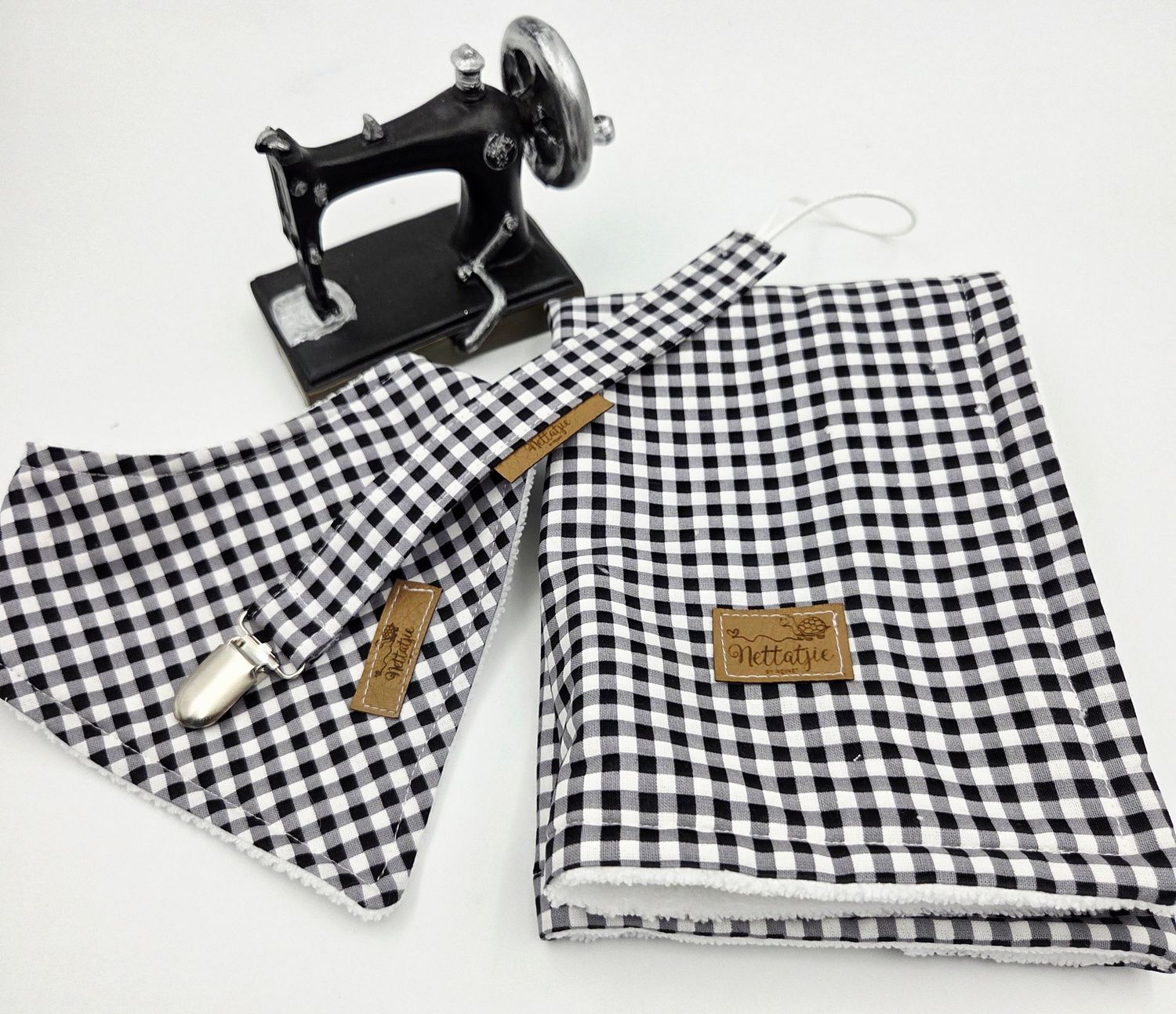 Black and white gingham fabric and sewing machine arranged in a product photography sequence.