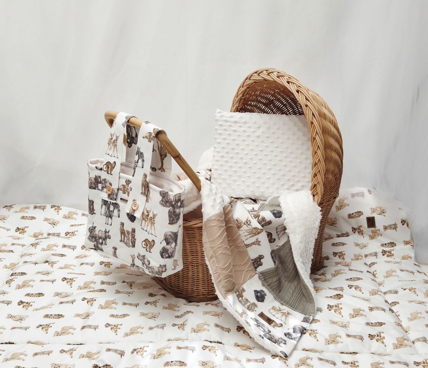 Wicker basket with cat-print fabric tote bag, minky blanket, and matching swaddle on white background.