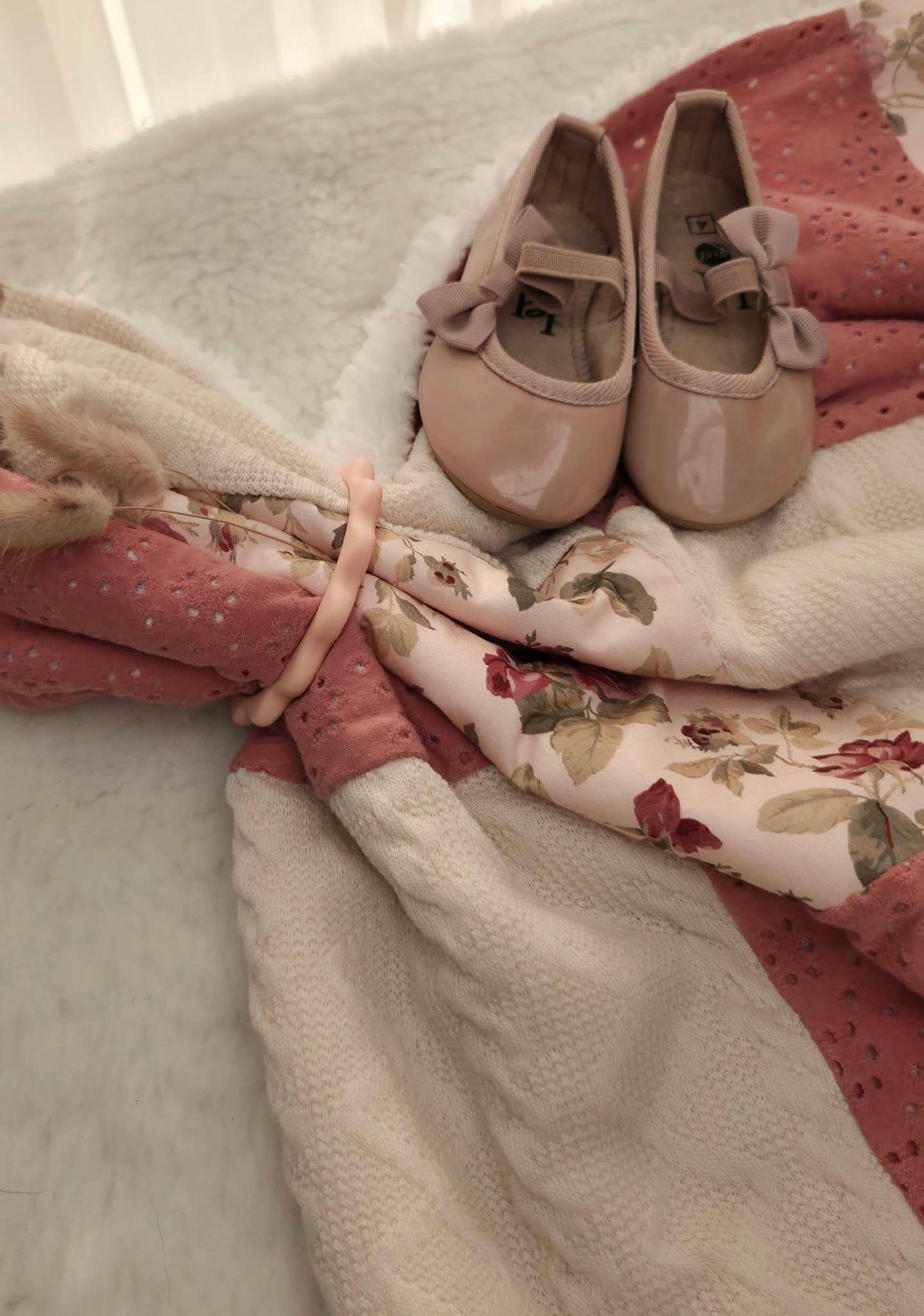 Pink baby girl outfit set with floral dress, polka dot top, and blush patent leather bow Mary Jane shoes.