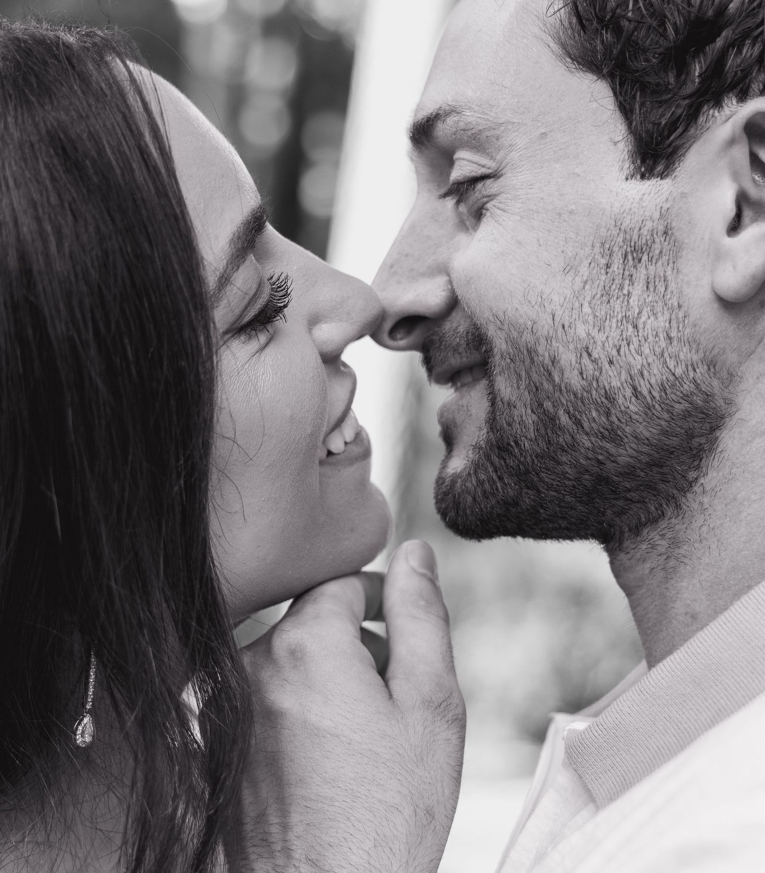 An intimate close-up series showing a couple's affectionate moment.