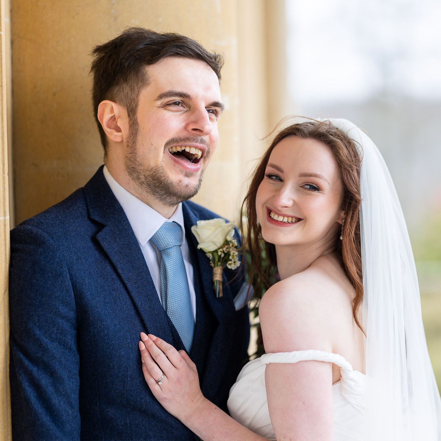 A series of sweet emotional moments at Buxted Park wedding in Sussex, laughing and embracing together.