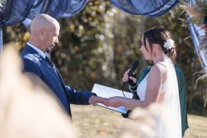 bride and groom exchanging rings