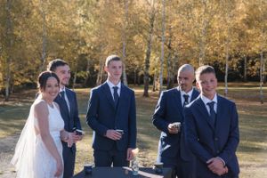 bride and groom with kids in wedding ceramony