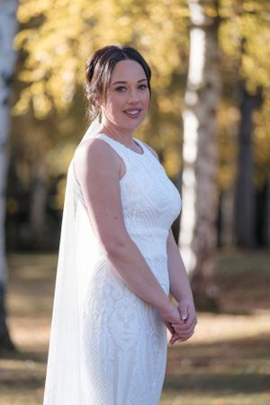 Stunning bridal photo in autumn sunset