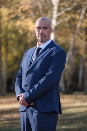 groom in autumn Haner Springs wedding