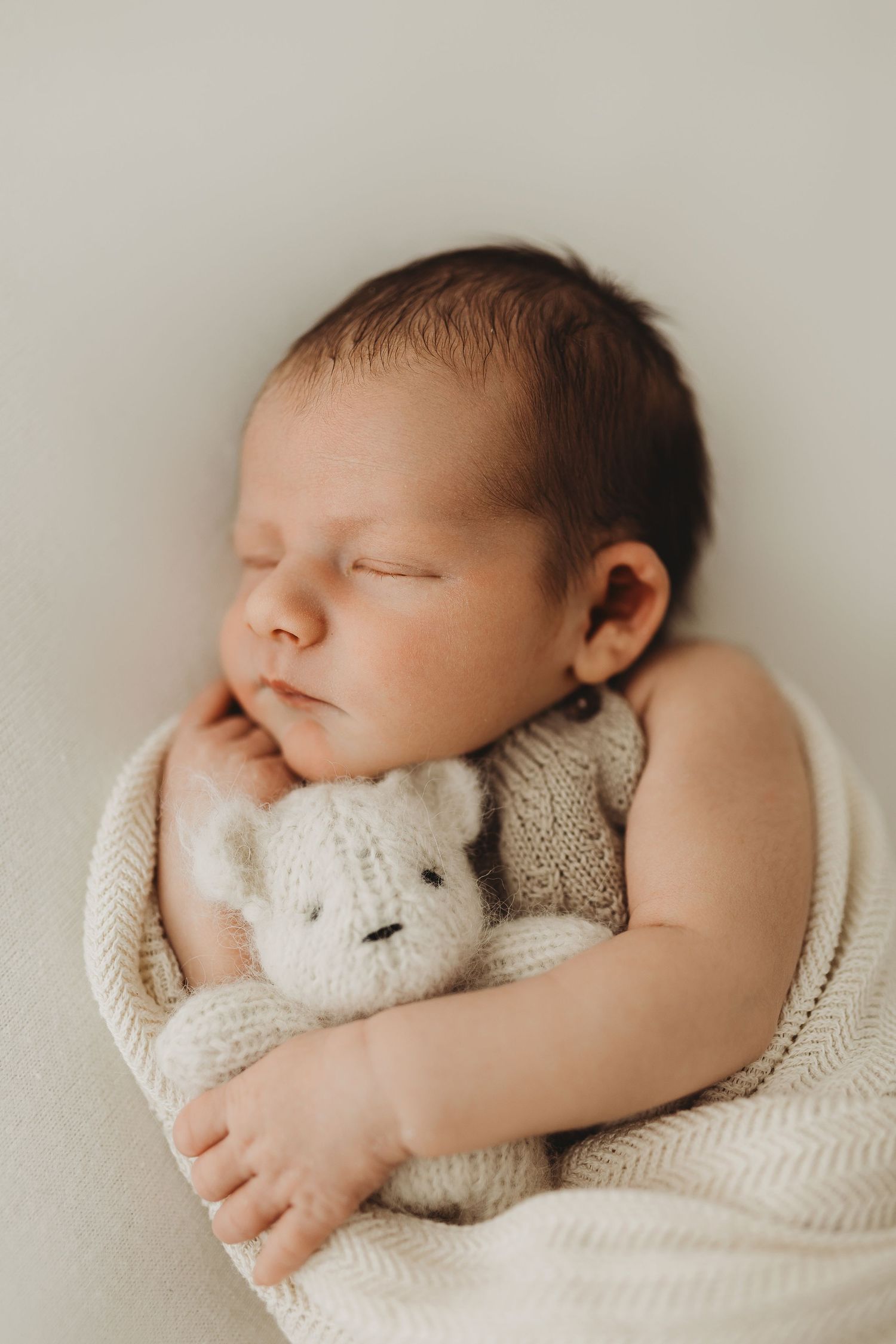 Newborn baby boy posing with prop Leigh on Sea Essex