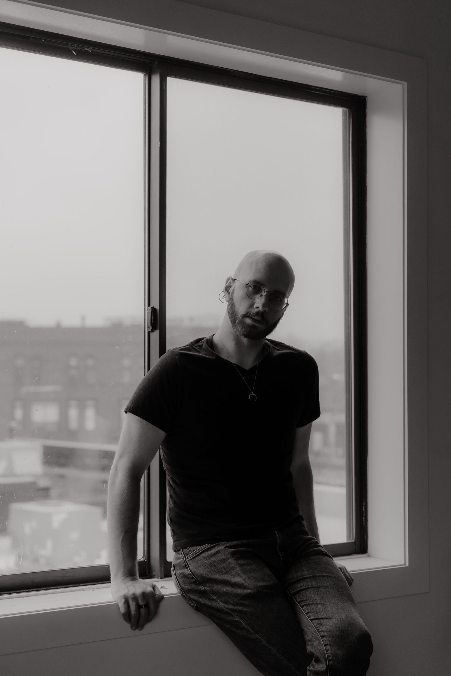 Michael posing by the window