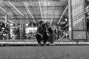 Cinematic engagement session under neon lights in Lisbon
