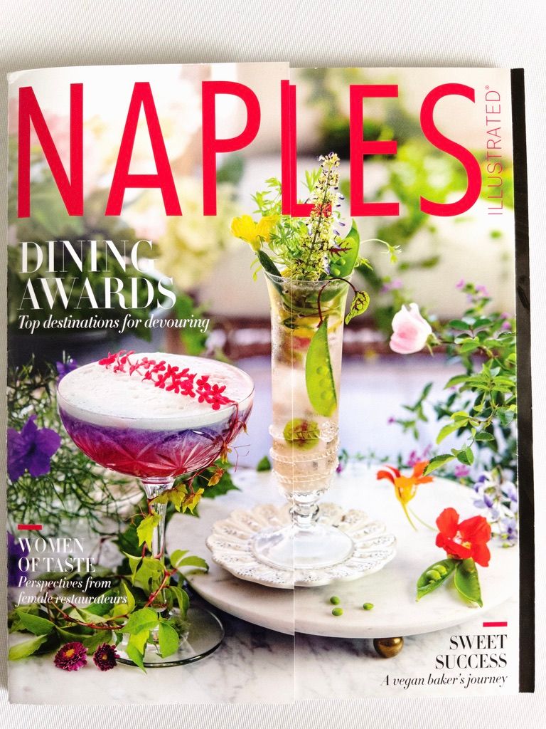 Naples Illustrated Dining Awards issue cover featuring elegant cocktails and floral arrangements.