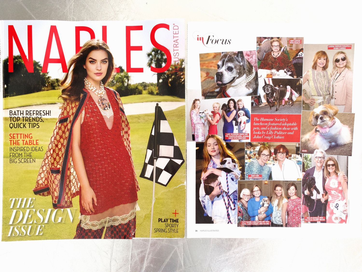 Naples Illustrated Design Issue magazine with woman in red dress on cover beside open interior pages.