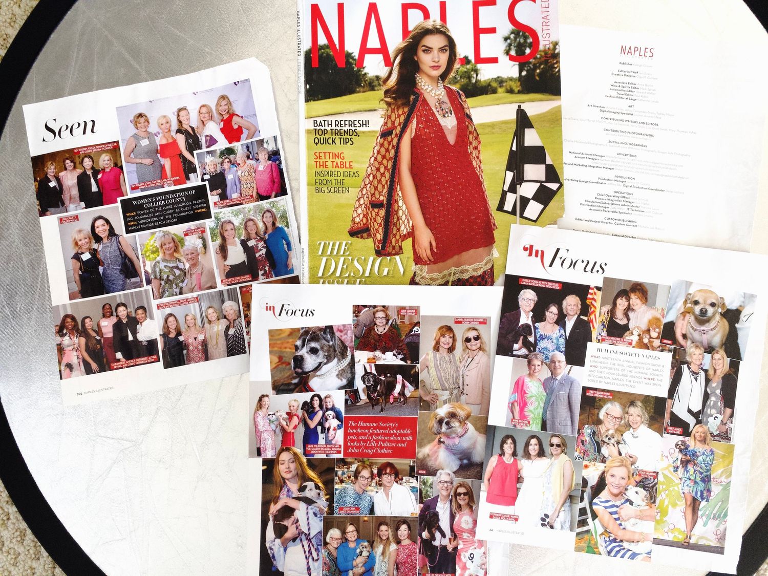 Naples Illustrated Design Issue magazine spread out showing multiple society and focus section pages.