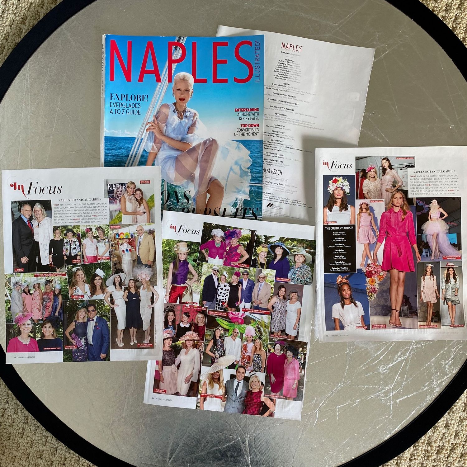 Naples Illustrated magazine with woman on yacht cover displayed with In Focus society photo pages.