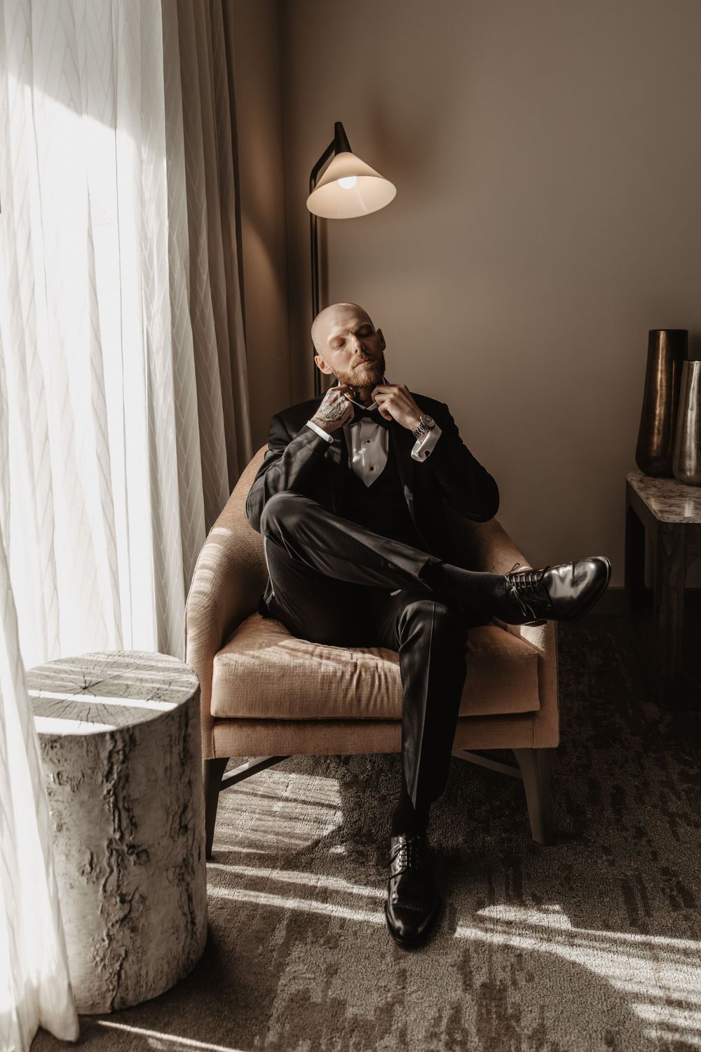 Artistic black and white photo series showing a person lounging thoughtfully in a sunlit window seat.