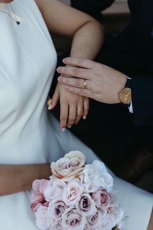 bride and groom elopement detail photography closeup of hands with wedding rings, microwedding photography in Moncton New Brunswick