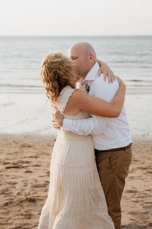 Couple kiss at sunset on the beach Conrad's Beach Nova  Scotia wedding photography packages, destination wedding photographer Dartmouth NS