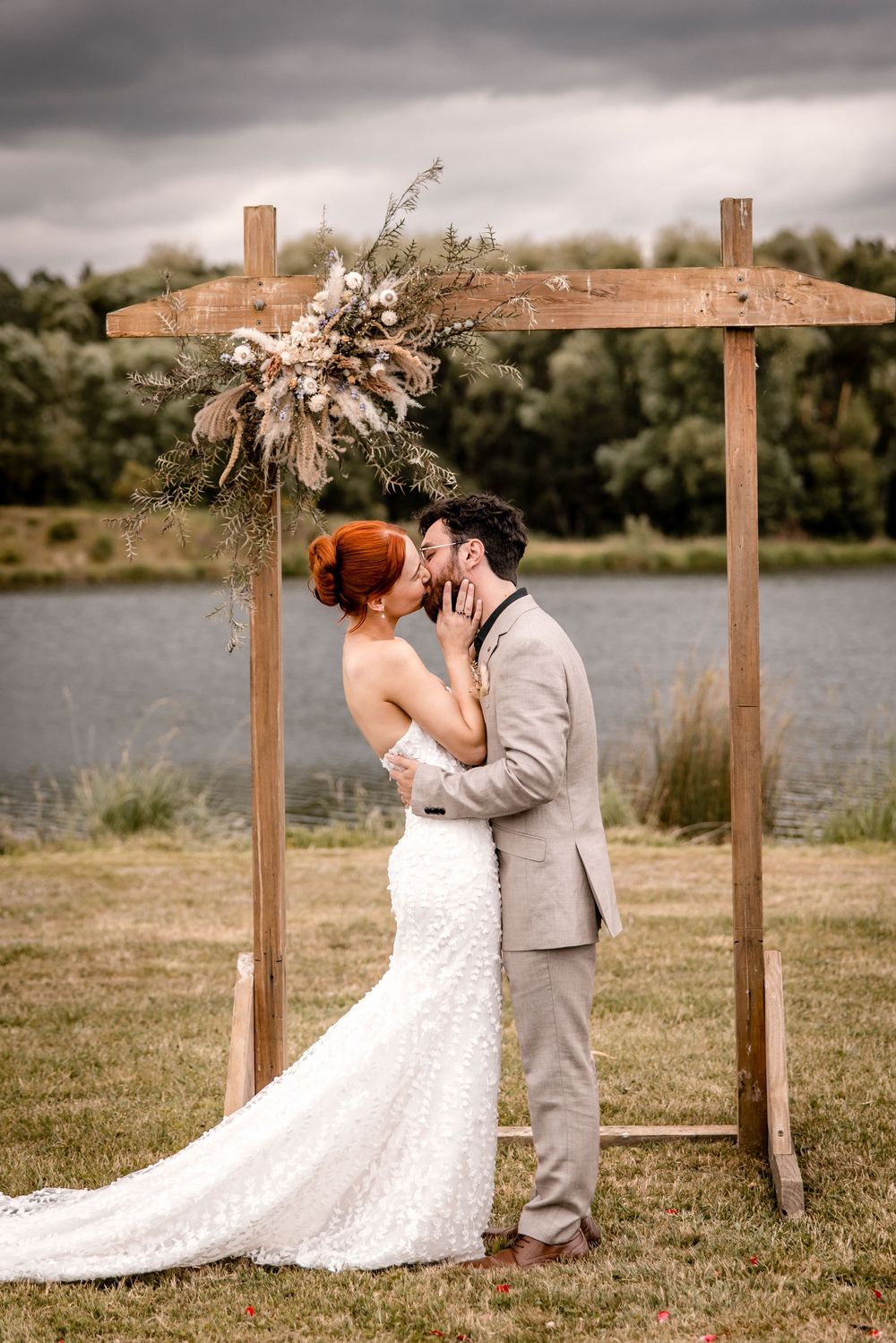 Bride and Groom Kiss at Back Paddock Lakes ceremony, Hawkes Bay