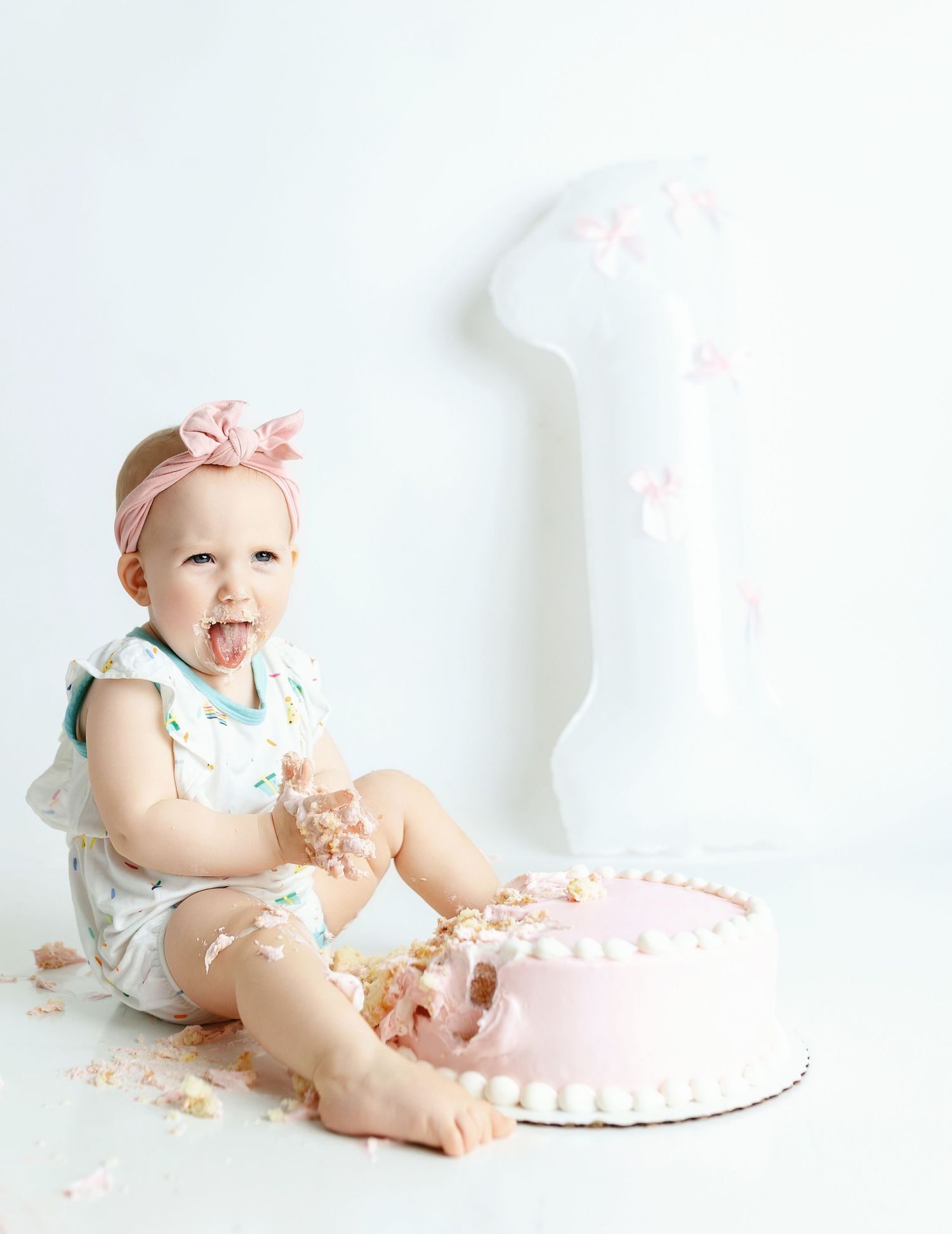 a little girl sticking her tongue out. Greenville, SC newborn photographer, Easley, SC newborn photographer, Upstate SC newborn photographer