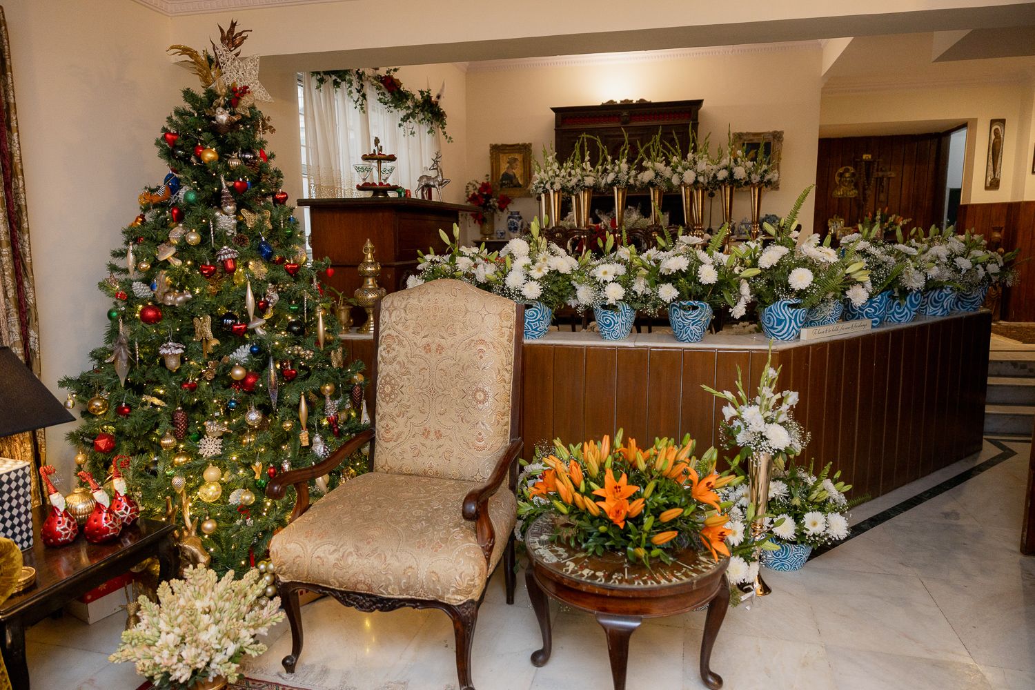 A festive collage of decorated Christmas trees with ornaments and lights in what appears to be a home interior setting.