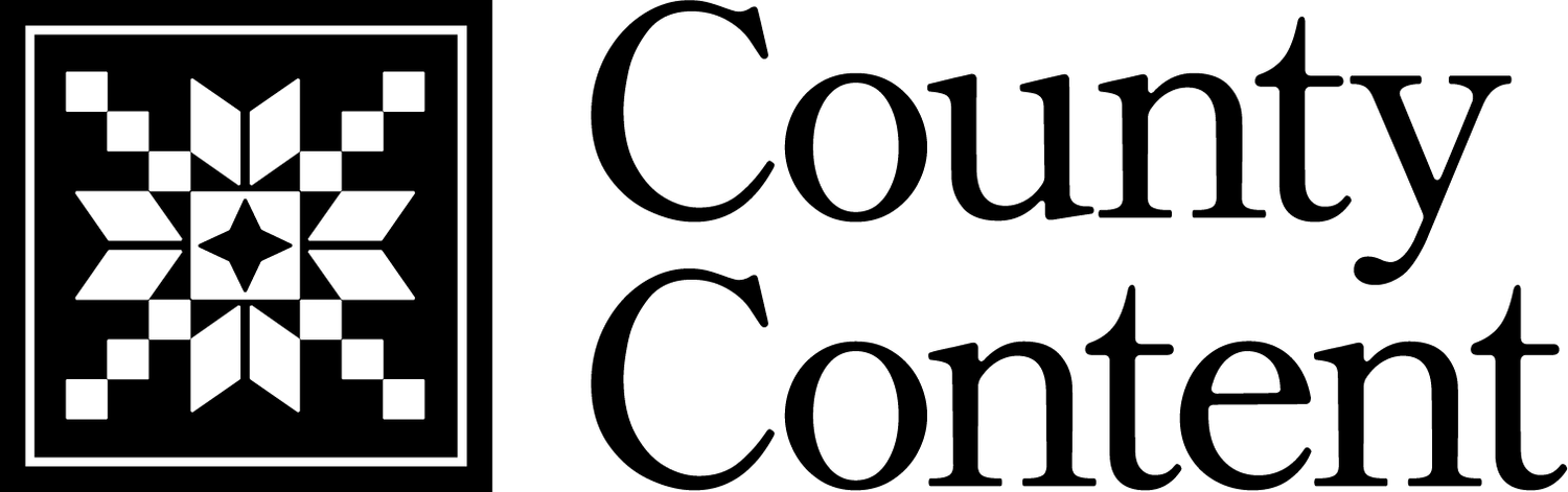 Black and white County Content logo featuring a geometric quilt square icon beside bold serif typography.