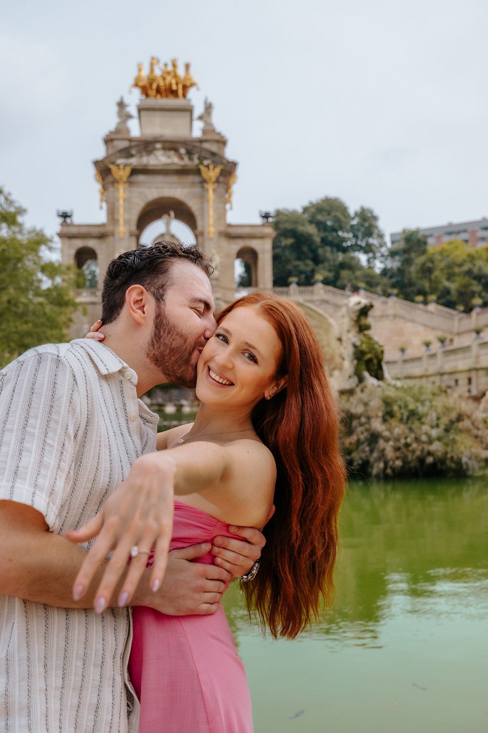 Couple hugging after proposal photoshoot in Barcelona