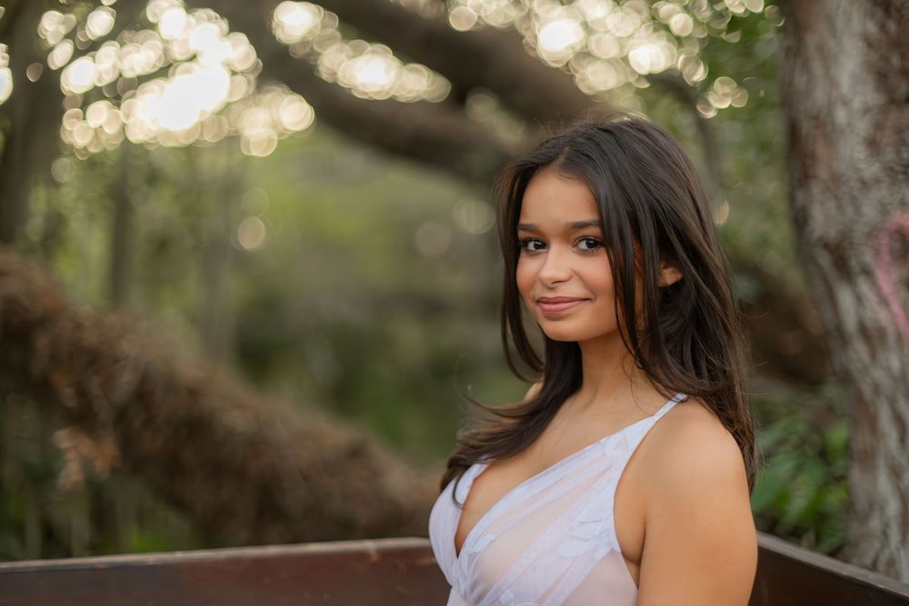 senior portrait at lookout tower at tree tops park in davie