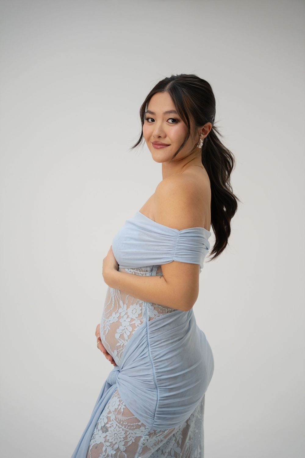 Maternity photoshoot of a woman in studio setting in Palatine, IL