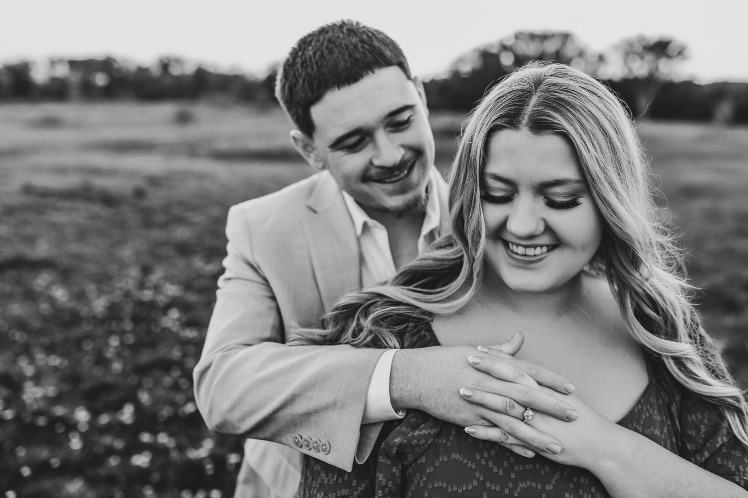 Engagement photos with sunset light over Grapevine Lake Texas.