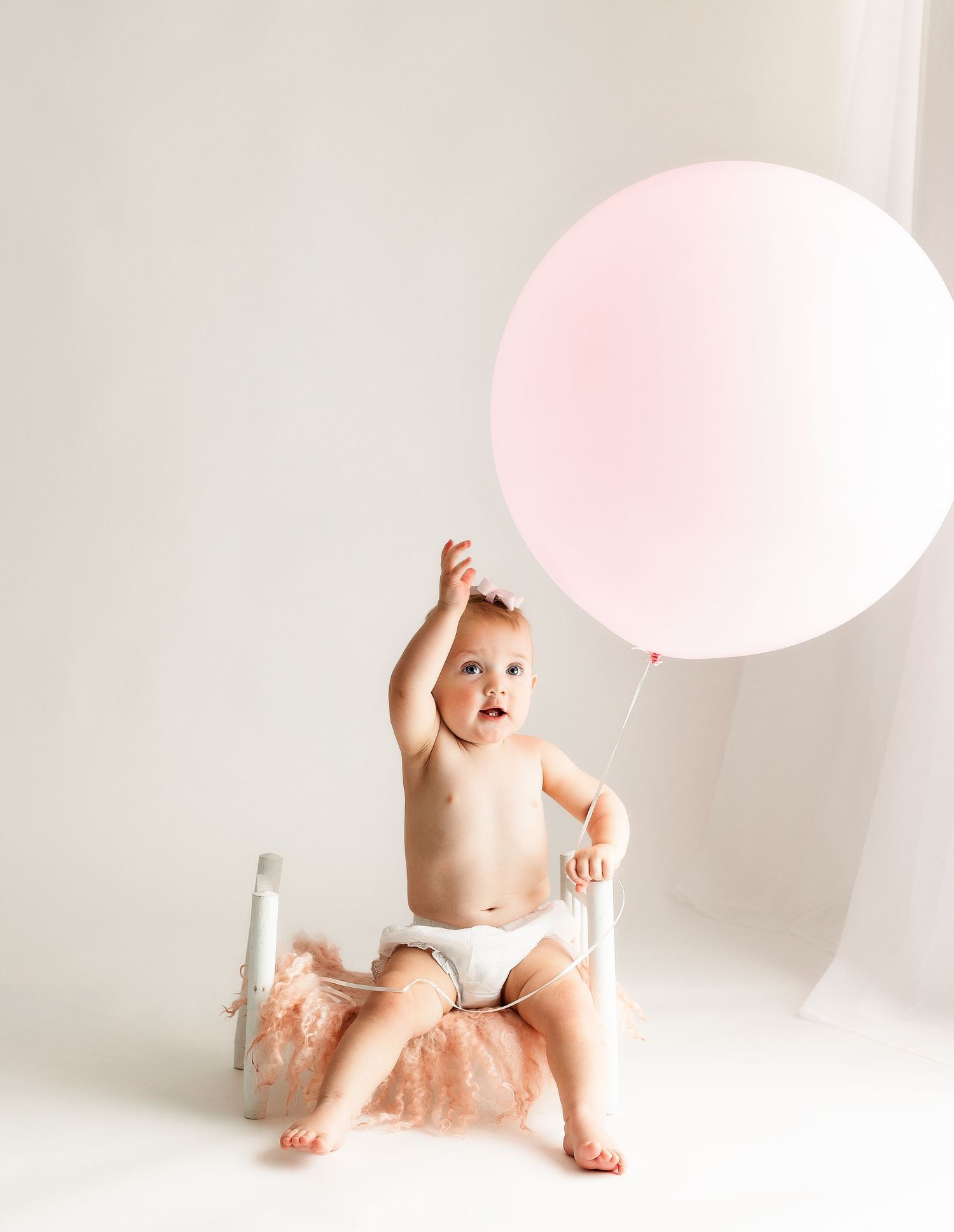 Baby with a balloon. Greenville sc newborn photographer, Easley sc newborn photographer, Upstate newborn photographer.
