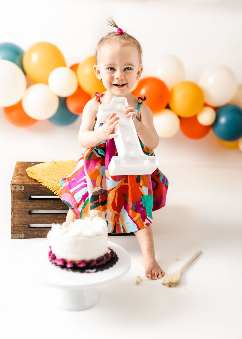 cake smash milestone session little girl turning one