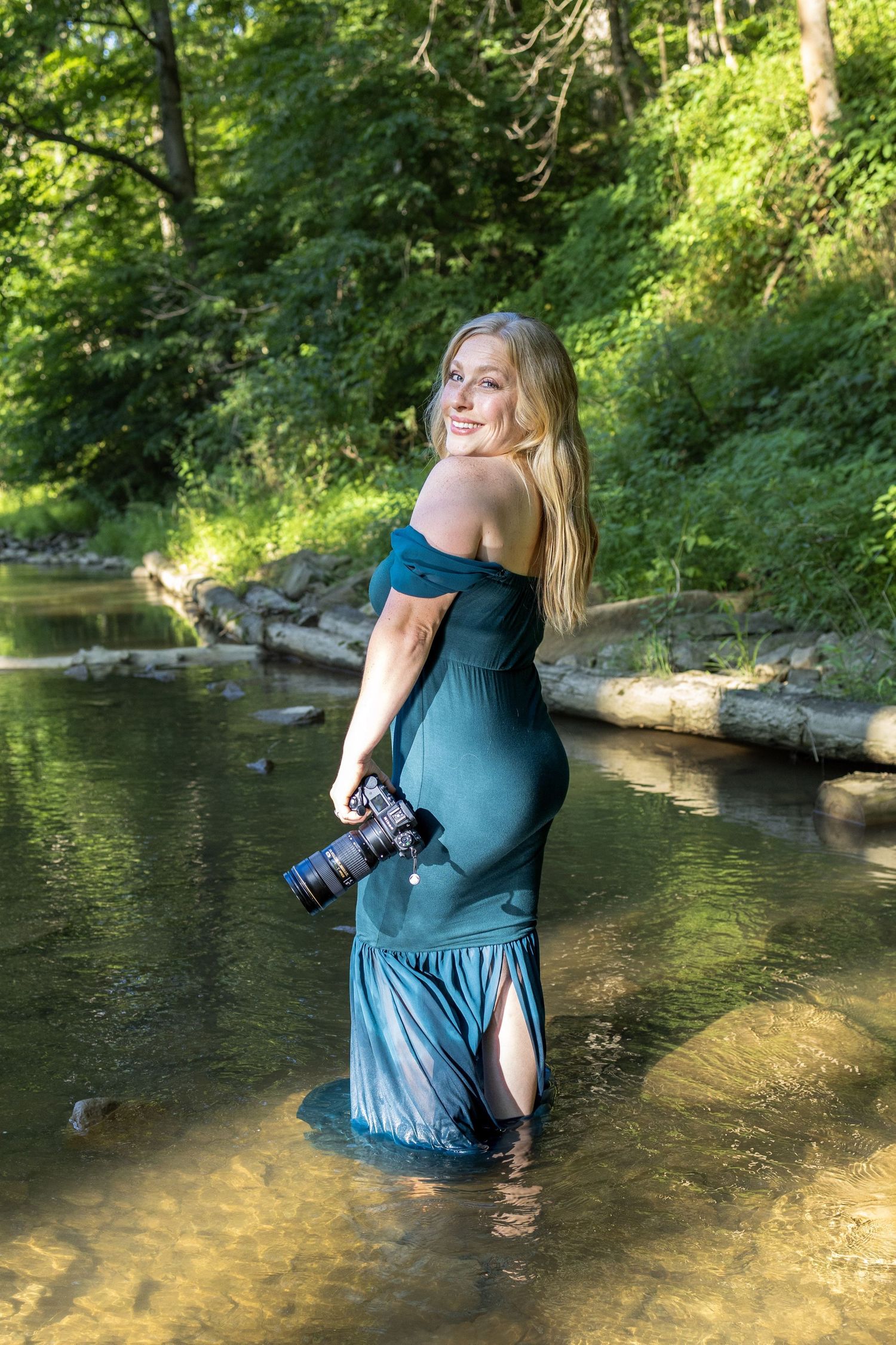 a photographer who's not afraid to get dirty or wet for the perfect shot