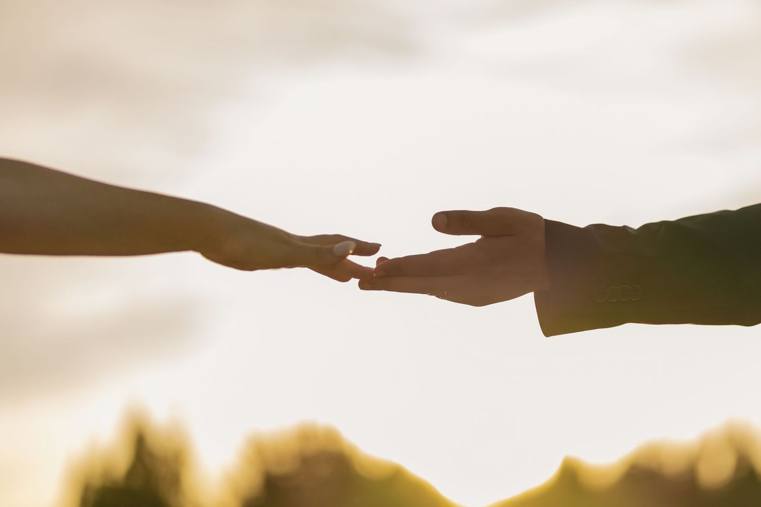 A bride and groom share an intimate moment together during their wedding photoshoot.