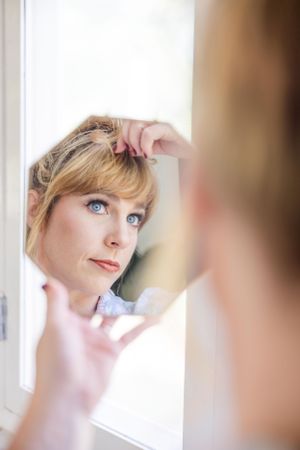 Soft portrait series showing delicate makeup and styling details.