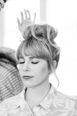 Artistic black and white portrait series with soft lighting and delicate styling.
