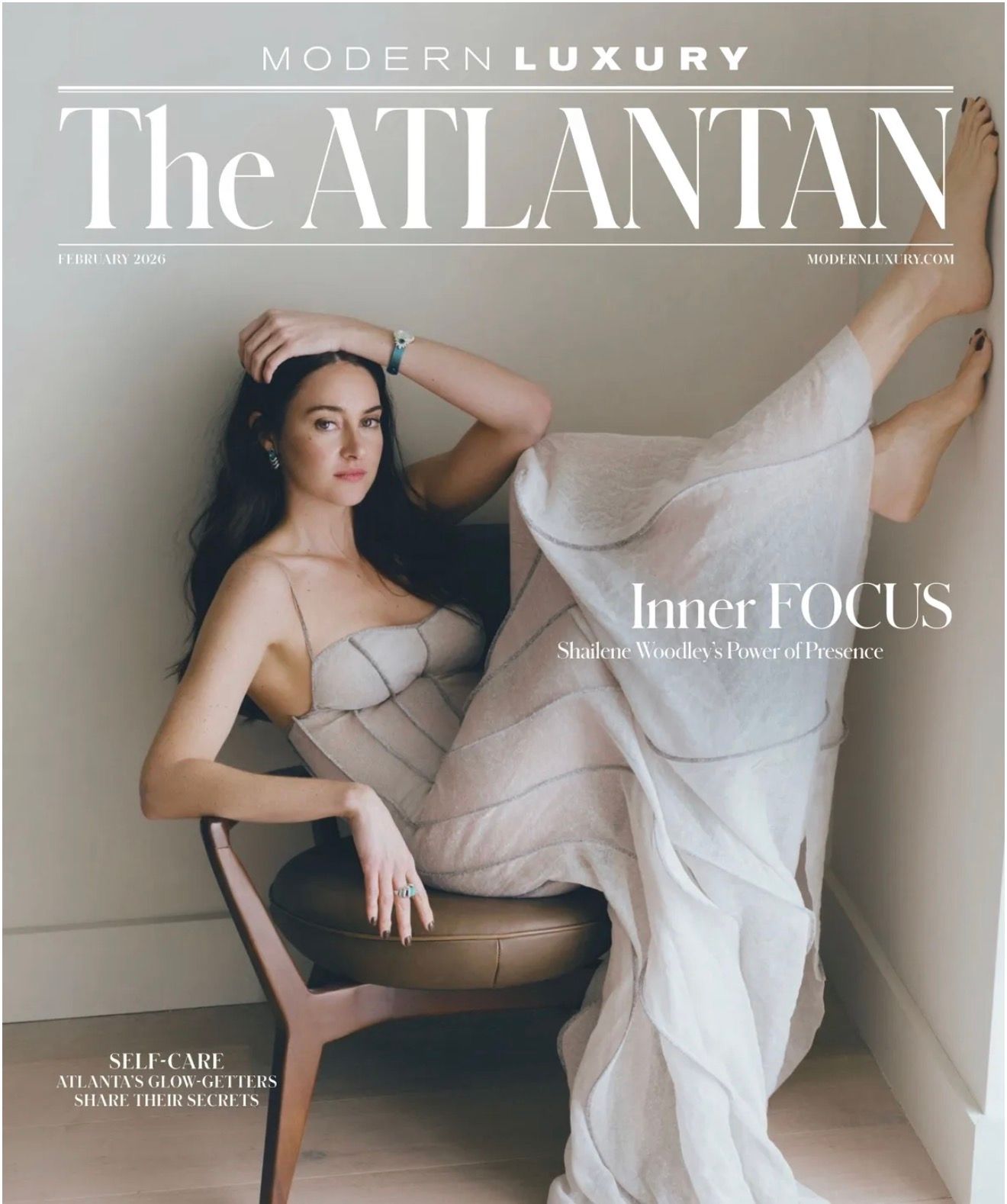 Ethereal bridal editorial photoshoot featuring flowing white fabric and soft, dreamy lighting for Modern Luxury magazine.