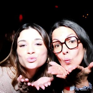 A series of playful photo booth style snapshots showing two friends making silly kissy faces at the camera.