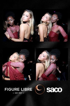 Four models pose together in red lace dresses at a fashion event for Figure Libre and Saco brands.