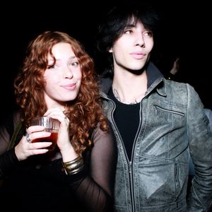 Series of candid photos showing two people in dim lighting with one wearing a denim jacket and another in dark clothing.