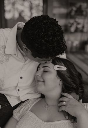 Black and white sequence showing tender romantic moments.