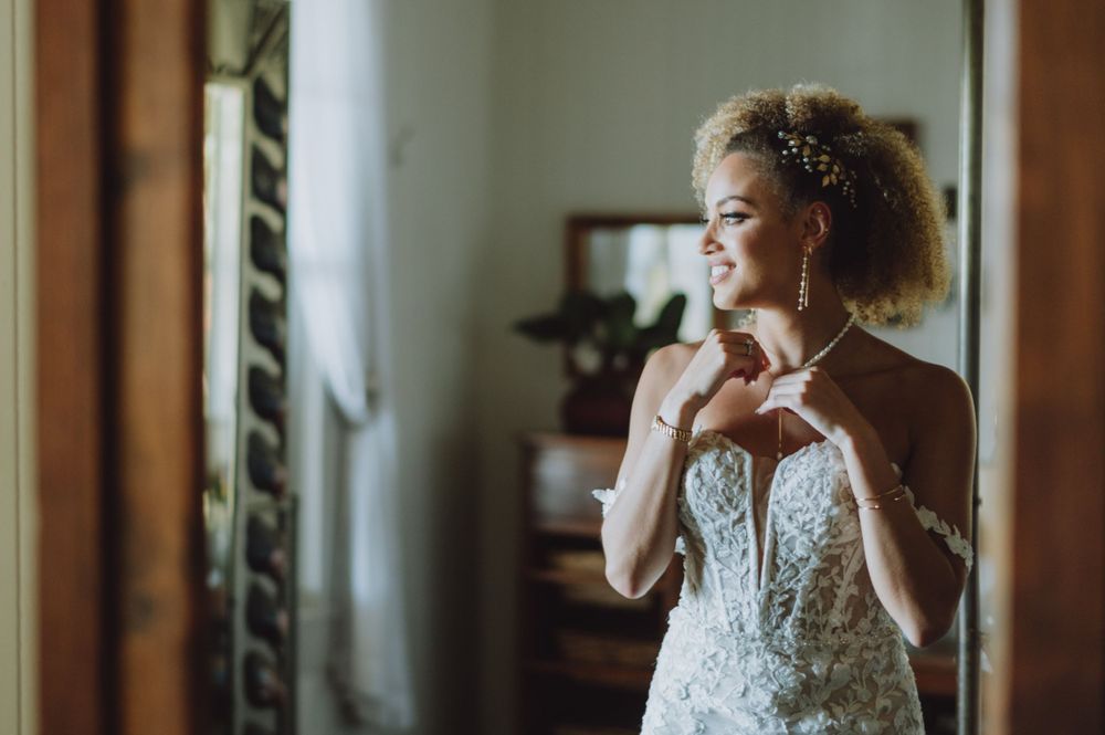 Intimate wedding day moments captured in natural window light.
