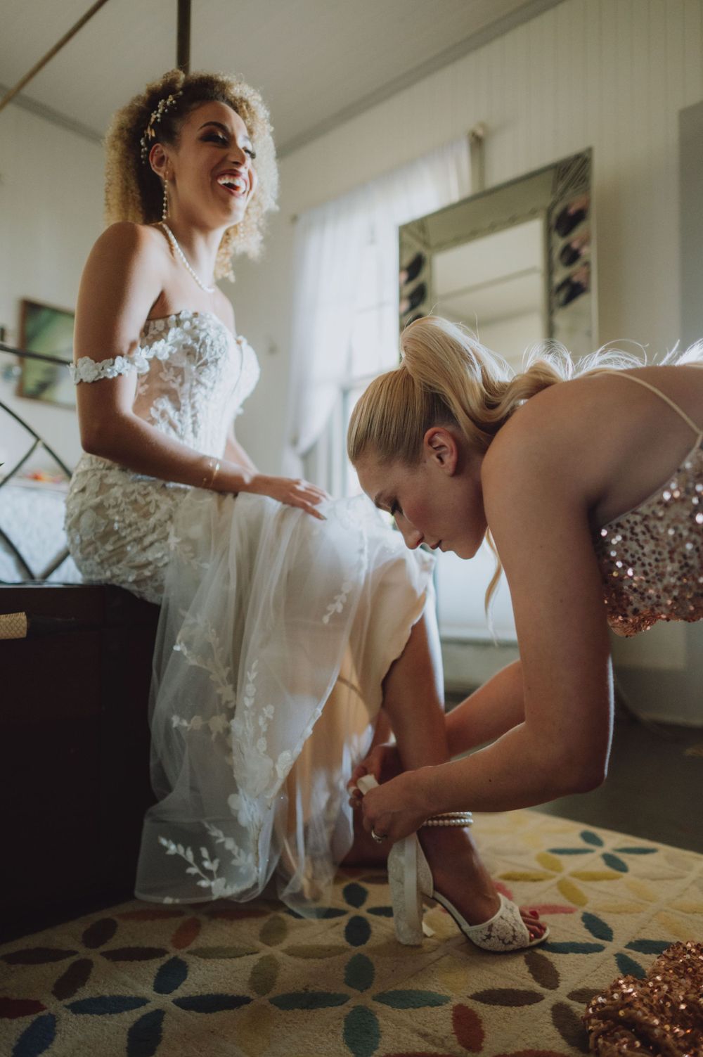 Wedding dress details and preparation moments captured in documentary style.
