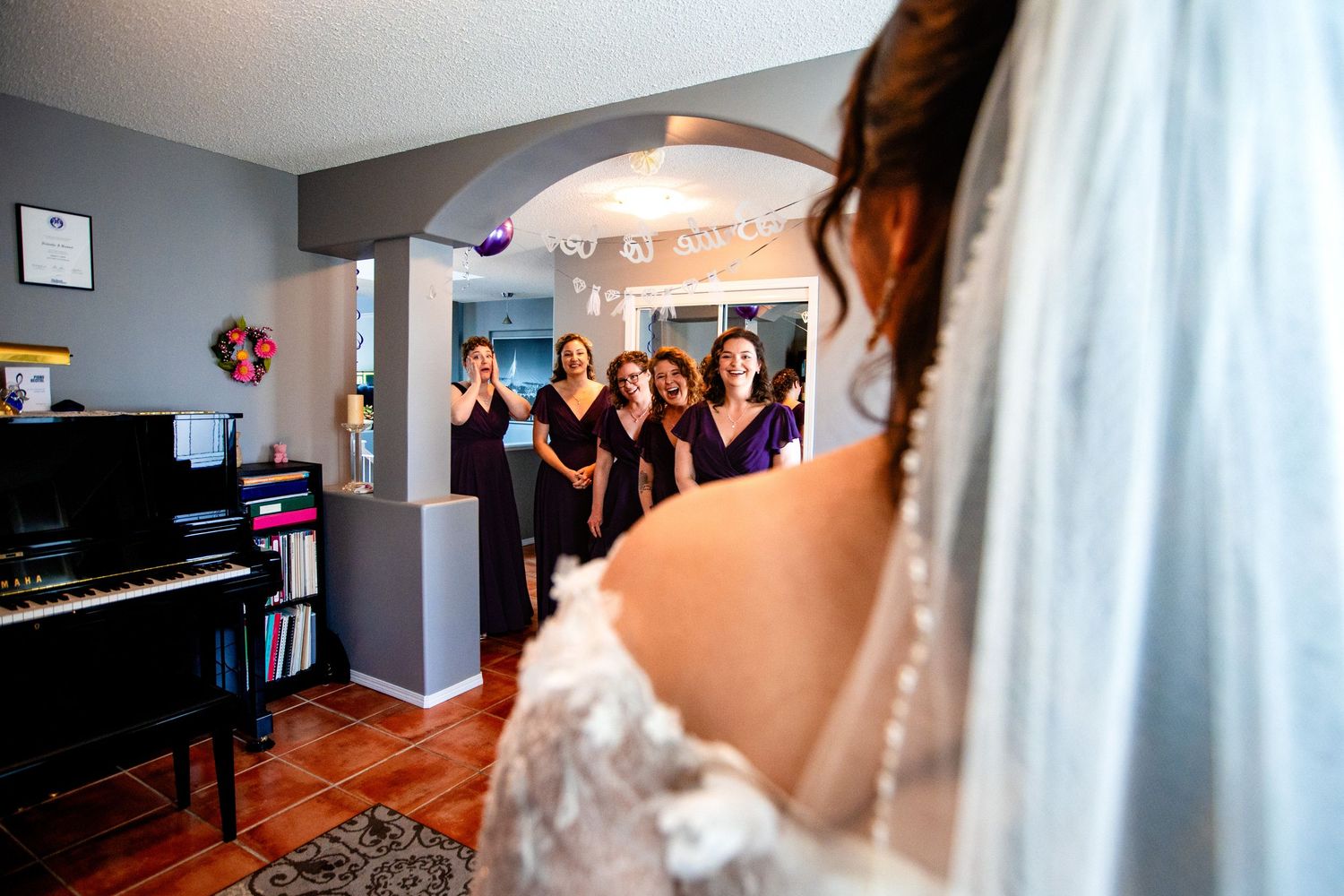 A sequence of wedding preparation moments showing dress details, dancing, and interior venue spaces.